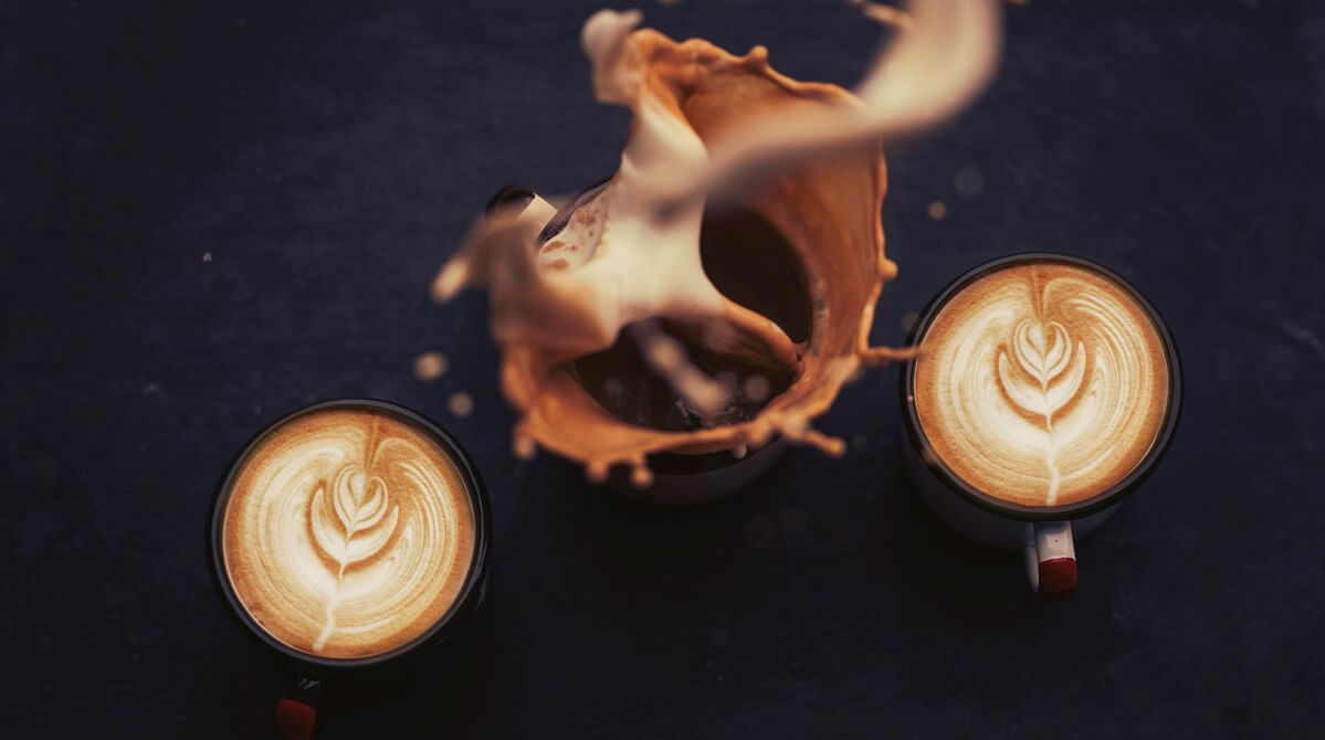 three cappuccinos latte art